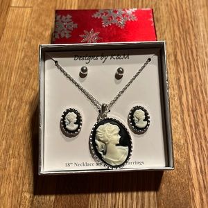 Cameo necklace with two sets of earrings